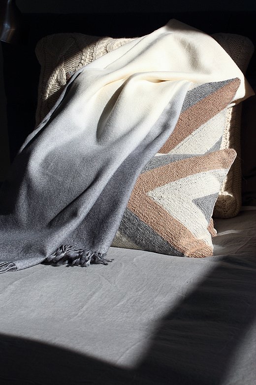 Named after an island in the Stockholm Archipelago, the Grinda pillows are hand-embroidered with supersoft baby-alpaca wool. Each equally soft Dip-Dye alpaca throw is hand-dyed by artisans in a small pot over an open fire to achieve its ombré effect.
